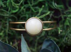 pin op brass n pearls