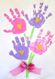 Pin this cute kid's diy handprint craft for mother's day, or just for the next homemade birthday gift from the kids! 12 Ways Of Making Handprint Flowers Guide Patterns