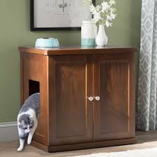 I had a oak base cabinet given to me and decided it would be perfect to conceal our cat litter. Flaherty Cat Box Cabinet Wayfair
