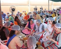 Image of BAPS volunteers performing Seva