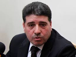 Bashar al-Assad names new Syrian PM after defection as rebels regain parts  of Aleppo