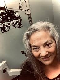 What is the going rate for an eye exam in Kelowna?