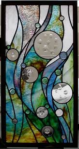 Although traditionally made in flat panels and used as windows, the creations of modern stained glass artists also include sculpture and other. 60 Window Glass Painting Designs For Beginners Glass Painting Designs Stained Glass Panels Stained Glass Art