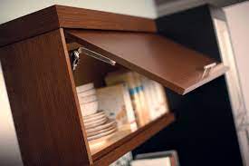 A Hinge Top Mechanism Often Works Best For Reaching Upper Storage Area Dura Supreme Cabinetry Cabinet Door Storage Door Storage Storage Solutions
