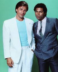 We can't get enough of these '80s stylings. Miami Vice Meeting Sonny Crockett In White Linen Bamf Style