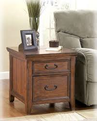 Wooden Rectangular End Table With File Cabinet With A Warm And Inviting Rustic Design The Woodboro Accent Table T End Tables Ashley Furniture Wood End Tables