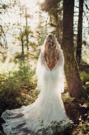 No matter where or how you're getting hitched, there's a gorgeous gown with arm coverage if you have boho bridal style, may we suggest this flowing floral lace gown with blouson sleeves? The Best Etsy Bohemian Wedding Dresses Junebug Weddings