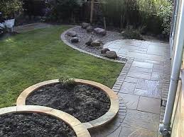 Garden In Classic Style Stone Circles Yor Stone Walling Edging Setts And Indian Natural Stone Pavin Circular Garden Design Garden Design Patio Garden Design