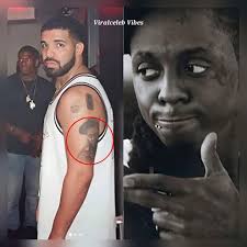 A Guide to All of Drake's 35 Tattoos and Their Meanings