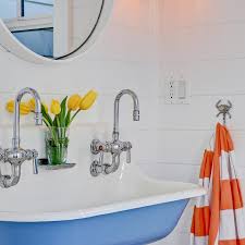 Keep the design basic, and choose a tile or a concrete floor. Pool House Bathroom Design Ideas