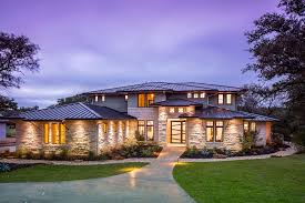 The architects sited the house on a wooded bluff, where it integrates beautifully with the surrounding natural oaks and massive outcroppings of texas sage. Texas Hill Country Modern 5105 2017 Parade Of Homes Sterling Custom Homes