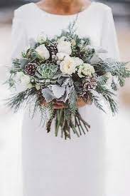 Add some crystals and a floral centerpiece would sparkle in a luxurious way. Winter Wedding Bouquets With Pine Cones Off 74 Buy