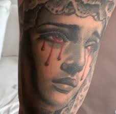 As worn by anuel aa. Anuel Aa S 16 Tattoos Their Meanings Body Art Guru