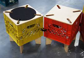 Making a milk crate coffee table with one of my original paintings as the table top. Combo Collab S Xtool Upcycled Milk Crate Seating Storage Solution Inhabitat Green Design Innovation Architecture Green Building