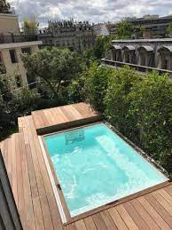 Une Piscine Sur Un Toit Terrasse A Paris Piscinelle Terrasse Paris Piscine Piscine Paris