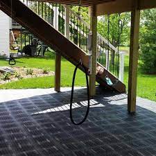 Adding a bathroom to a detached garage will save time from having to make extra trips into the house. Outdoor Flooring Over Grass Or Dirt Interlocking Tiles