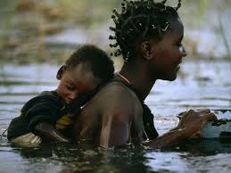 Africa Sights And Sounds Mbukushu Mother And Child Crossing The Flooded Okavango River In Botswana Mother And Child Mothers Love National Geographic Photos