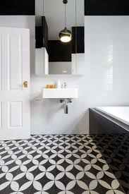 Use retro metro for a vintage new york subway look first made famous by the architects of the new york subway at the turn of the 20 th century, these rectangular wall tiles have become a recurring staple of interior design over the last 100 years. 11 Black And White Tile Bathroom Floor Ideas Home Decor Bliss