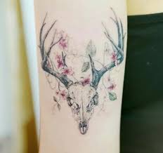 Skull designs are often colorless, they actually include color but they are usually. 10 Deer Skull With Flowers Tattoo Designs Petpress