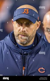 Chicago Bears' head coach Mike Ditka looks over guard Mark Bortz