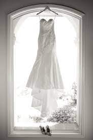 Pin By Alexandra On Wedding Ideas Wedding Dress Photography Hanging Wedding Dress Wedding Dress Preservation