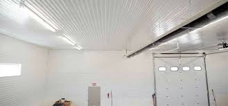 8 Garage Ceiling Ideas For That Finished Look Garage Tool Advisor Garage Walls Painted Garage Walls House Cladding