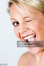 12 Augenzwinkern Stock Photos, High-Res Pictures, and Images