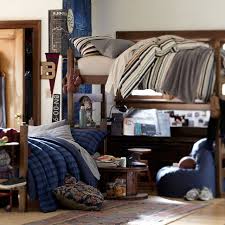 The red brick wall combines with dark wood creates a masculine ambiance throughout the room. 50 Inspiration Dorm Room Ideas For Guys Pinterest