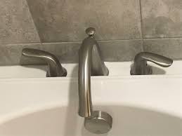 It is a delta monitor, single handle style. Delta Bathtub Faucet Unaligned Handle Stopper Home Improvement Stack Exchange