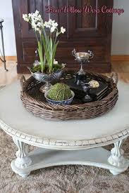 A big clock or mora clock. If You Like It Then You Ll Want To Put A Tray Under It Vintage American Home French Country Coffee Table Decor Coffee Table Vignettes