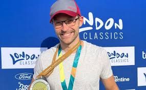 Tom Ralph jumps in the deep end in Swim Serpentine Two Mile