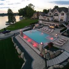 Unique Waterfront Home With Helicopter Pad Designed By Antonelli Mansions Waterfront Homes Luxury House Designs