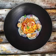 Tagliatelle With Seafood Shrimp Sauce And Scallops In Beurre Noisette And Cognac
