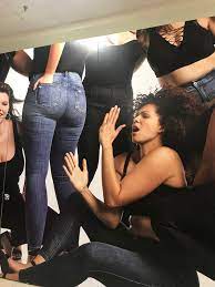 This ad for a new store in the mall makes it look like the model with her  back turned farted in the main girls face : rCrappyDesign