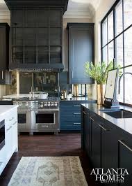 European and italian kitchen cabinets. Black Kitchen Hood With Antiqued Mirrored Cooktop Backsplash Contemporary Kitchen