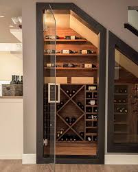 A press comes down to crush the grapes in the bucket, and the juice is collected in a container below it. 21 Home Wine Room Design Organization Ideas Extra Space Storage