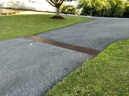 They are installed in front of the garage to help. Driveway Drainage Trenchdrainblog Com