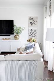 Tresha demonstrates how to makeover an ikea tv stand by adding mirrored doors and overlay. Modern Media Console Ikea Besta Hack Caitlin Marie Design