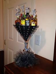 Alcohol 21st Birthday Ideas For Guys 21st Alcohol Arrangement Martini Cup 21 Mini Alcohol Bottles Liquor Gifts Alcohol Gifts Liquor Bouquet