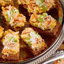 Here are some cool appetizer recipes that are fun to make and the tea sandwiches can be made in many different ways but should be easy to handle and eaten in a couple of bites. 10 Easy Finger Sandwich Recipes Myrecipes