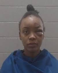 Woman assaults officer at Bombshells nightclub