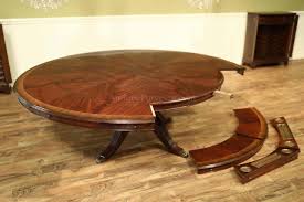 This circular table has a 38 inch diameter and displays a striking tile design at the center that adds depth and character to the piece. Furniture Store Traditional Office And Dining Furniture