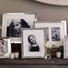 Keep the same distance between each frame. Image Result For How To Display Family Photos On A Table Display Family Photos Picture Frame Table Photo Frame Display