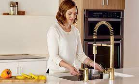 No matter what angle you finish using the spray head, the faucet will retract securely and naturally with no problem. New Brushed Gold Moen Align Kitchen Faucets Plumbersstock Blog