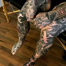 This tattoo involves different tribal designs like small triangles, black inked waves, and spirals that make up a whole tribal. 125 Best Leg Tattoos For Men Cool Ideas Designs 2021 Guide