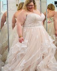 This Strapless Empire Waist Bridal Gown Has A Whimsical Tiered Organza Skirt Curvy Brid Wedding Dresses Whimsical Wedding Dresses Plus Size Bridal Dresses