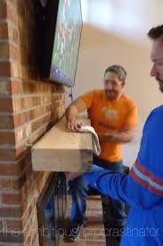 Make sure those marks are level, centered. The Ambitious Procrastinator Dead Trees Can Be Festive Home Fireplace Floating Mantel Brick Fireplace