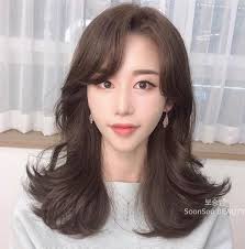 The curly pinned bun gives a chic and cute look to the face. 40 Best Ideas How To Cut And Style Side Bangs In 2021 Hair Adviser