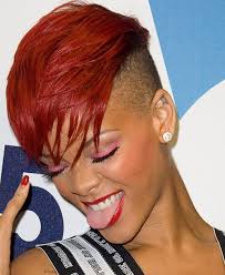 Gone are the days where black women feel that it's necessary to straighten their hair with chemicals or a pressing comb just to deal with it. 50 Mohawk Hairstyles For Black Women Stayglam Rihanna Short Hair Hair Styles Mohawk Hairstyles