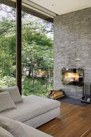 薪ストーブ ビルトイン暖炉 atelier137 architectural design office クラシックデザインの リビング 石 灰色 homify インテリア レイアウト 家 暖炉